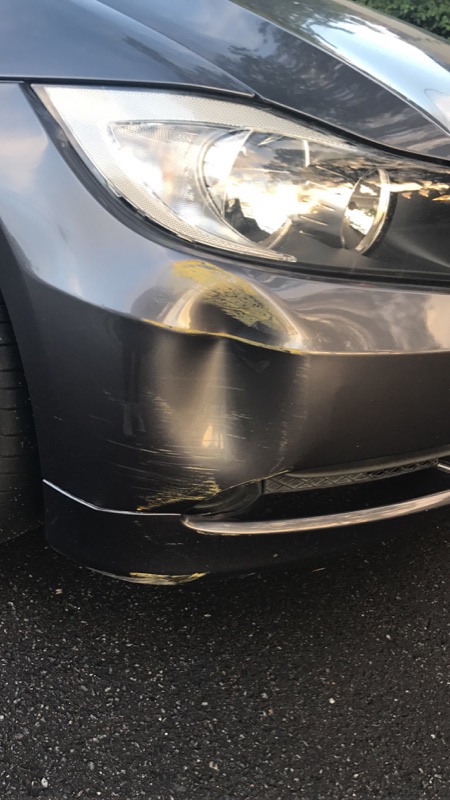 Before photo of grey front bumper scuff damage